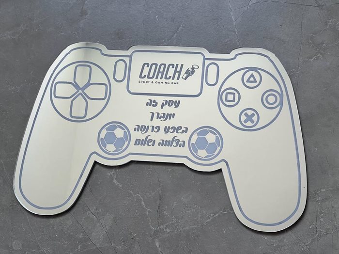 ברכת העסק בצורת שלט פלייסטיישן